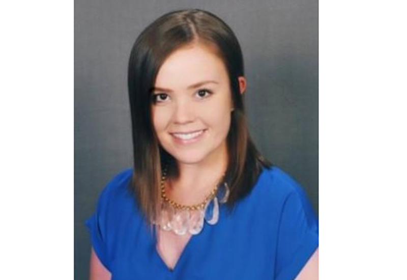 young woman in blue shirt