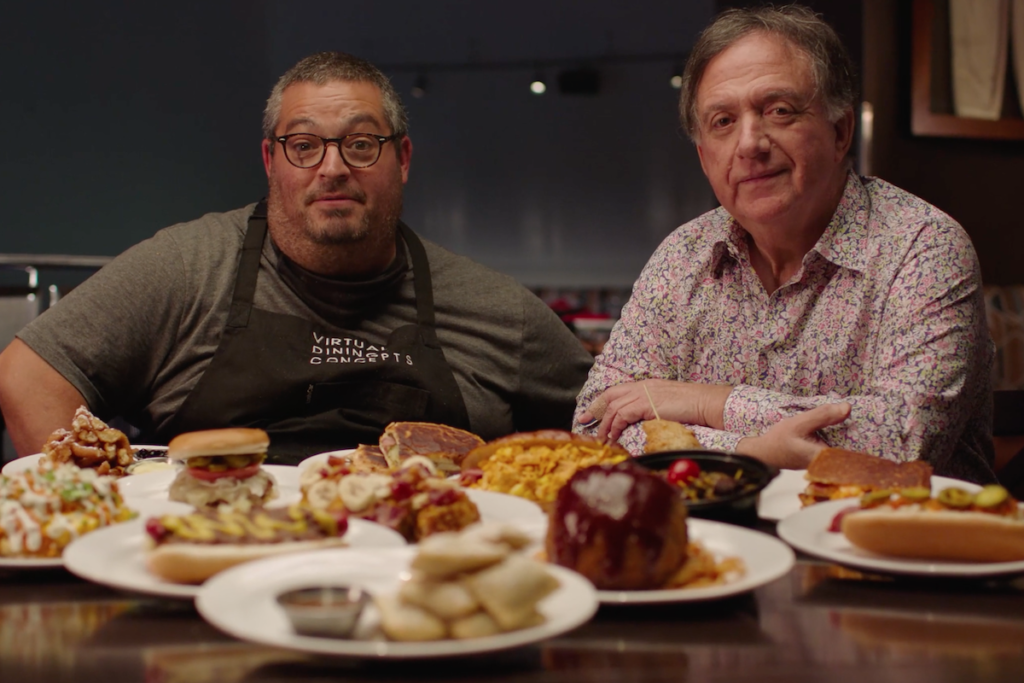 Eric Greenspan (left), culinary director at Virtual Dining Concepts, and Robert Earl, co-founder of VDC, introduce NASCAR Refuel in a promotional video. 